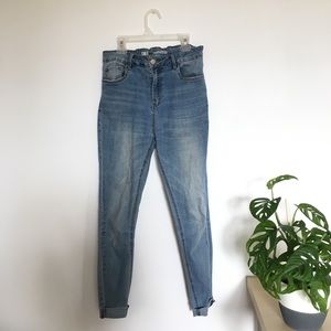 High Rise Super Skinny Medium Wash Jeans.
